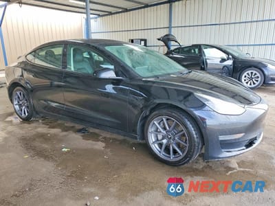 Czwarte zdjęcie samochodu z boku: 2022 TESLA MODEL 3 VIN:5YJ3E1EA2NF191323 - miniatura