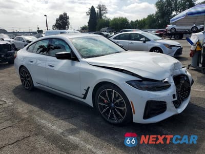 Czwarte zdjęcie samochodu z boku: 2024 BMW I4 XDRIVE 40 VIN:WBY83FB02RFT23615 - miniatura