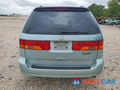 Zdjęcie 6 z 13 samochodu: 2004 HONDA ODYSSEY EX VIN:5FNRL18674B056361 - miniatura
