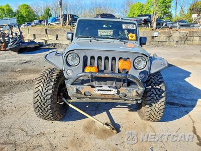 Piąte zdjęcie samochodu w środku: 2015 JEEP WRANGLER UNLIMITED SAHARA VIN:1C4HJWEG8FL526442 - miniatura