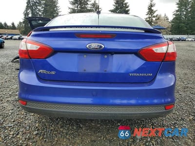 Zdjęcie 6 z 11 samochodu: 2014 FORD FOCUS TITANIUM VIN:1FADP3J20EL230468 - miniatura