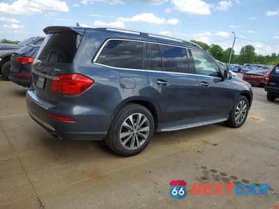 Trzecie zdjęcie samochodu z tyłu: 2015 MERCEDES-BENZ GL 450 4MATIC VIN:4JGDF6EE2FA498823 - miniatura
