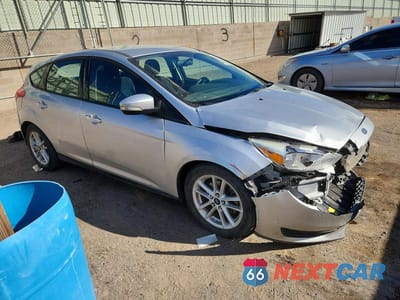 Czwarte zdjęcie samochodu z boku: 2016 FORD FOCUS SE VIN:1FADP3K22GL387565 - miniatura