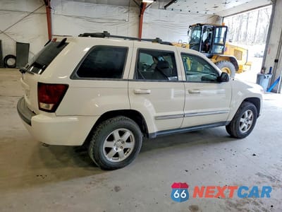 Trzecie zdjęcie samochodu z tyłu: 2010 JEEP GRAND CHEROKEE LAREDO VIN:1J4PR4GK7AC148983 - miniatura