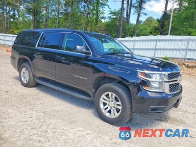Czwarte zdjęcie samochodu z boku: 2019 CHEVROLET SUBURBAN C1500 LS VIN:1GNSCGKC3KR180578 - miniatura