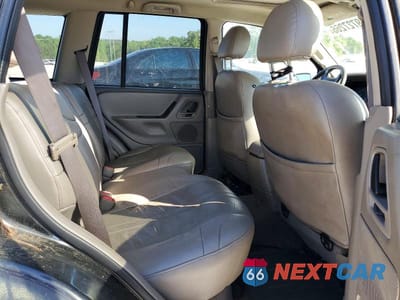 Zdjęcie 11 z 13 samochodu: 2004 JEEP GRAND CHEROKEE LAREDO VIN:1J4GW48N04C319420 - miniatura