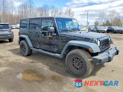 Czwarte zdjęcie samochodu z boku: 2011 JEEP WRANGLER UNLIMITED SPORT VIN:1J4BA3H10BL583556 - miniatura