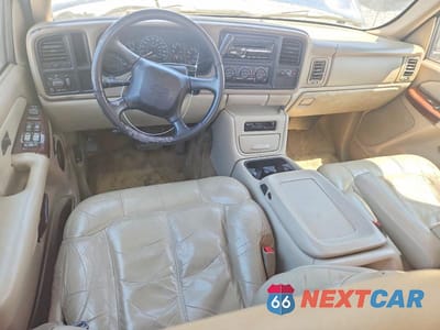 Zdjęcie 8 z 14 samochodu: 2001 CHEVROLET TAHOE C1500 VIN:1GNEC13T21J309366 - miniatura