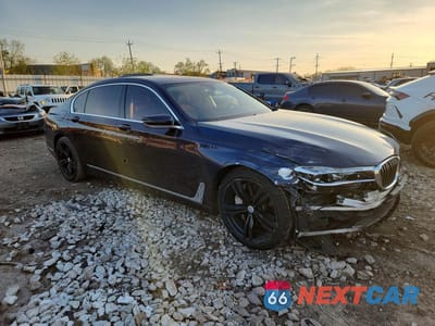 Czwarte zdjęcie samochodu z boku: 2016 BMW 750 XI VIN:WBA7F2C5XGG417172 - miniatura