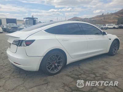 Trzecie zdjęcie samochodu z tyłu: 2019 TESLA MODEL 3 VIN:5YJ3E1EAXKF504081 - miniatura