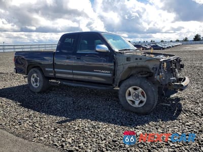 Czwarte zdjęcie samochodu z boku: 2000 TOYOTA TUNDRA SR5 VIN:5TBBT4411YS028658 - miniatura