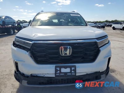 Piąte zdjęcie samochodu w środku: 2024 HONDA PILOT TOURING VIN:5FNYG1H72RB023817 - miniatura