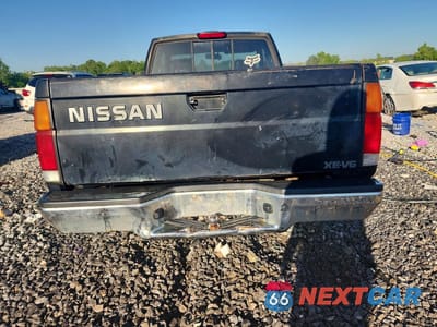 Zdjęcie 6 z 12 samochodu: 1994 NISSAN TRUCK XE V6 VIN:1N6HD16Y1RC398077 - miniatura