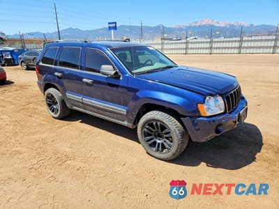 Czwarte zdjęcie samochodu z boku: 2005 JEEP GRAND CHEROKEE LAREDO VIN:1J4GR48K25C718084 - miniatura