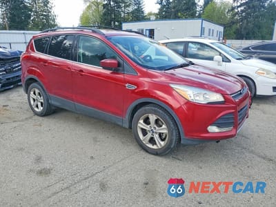 Czwarte zdjęcie samochodu z boku: 2014 FORD ESCAPE SE VIN:1FMCU0GX6EUD34646 - miniatura
