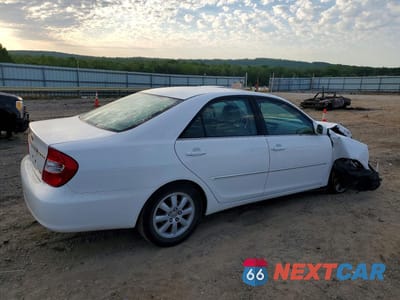 Trzecie zdjęcie samochodu z tyłu: 2002 TOYOTA CAMRY XLE V6 VIN:JTDBF30K720001725 - miniatura
