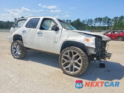 Czwarte zdjęcie samochodu z boku: 2010 GMC YUKON SLT VIN:1GKUCCE06AR184512 - miniatura