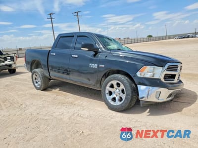 Czwarte zdjęcie samochodu z boku: 2017 RAM 1500 SLT VIN:1C6RR7LT1HS634002 - miniatura