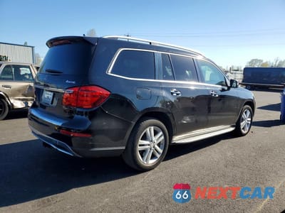 Trzecie zdjęcie samochodu z tyłu: 2013 MERCEDES-BENZ GL 450 4MATIC VIN:4JGDF7CE3DA132553 - miniatura