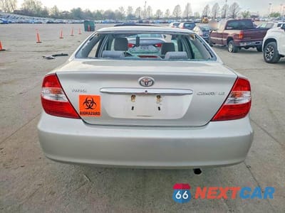 Zdjęcie 6 z 11 samochodu: 2003 TOYOTA CAMRY LE VIN:4T1BE32K53U781567 - miniatura