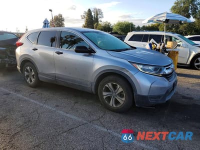 Czwarte zdjęcie samochodu z boku: 2018 HONDA CR-V LX VIN:2HKRW5H38JH415444 - miniatura