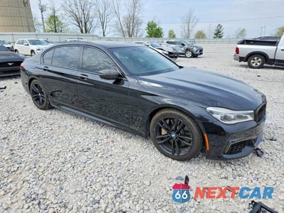 Czwarte zdjęcie samochodu z boku: 2016 BMW 750 XI VIN:WBA7F2C56GGE12389 - miniatura