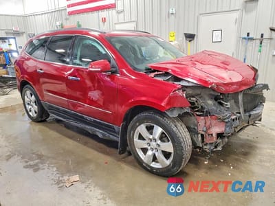 Czwarte zdjęcie samochodu z boku: 2014 CHEVROLET TRAVERSE LTZ VIN:1GNKVJKD0EJ167886 - miniatura