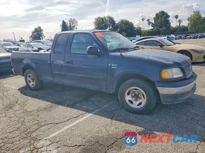 Czwarte zdjęcie samochodu z boku: 1999 FORD F-150 VIN:1FTRX17L2XKB33706 - miniatura