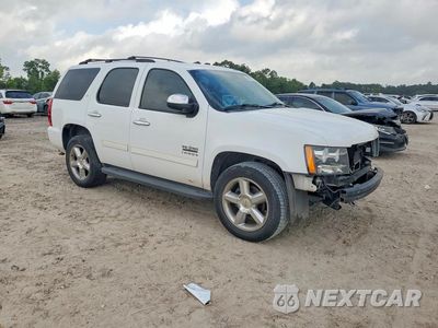 Czwarte zdjęcie samochodu z boku: 2012 CHEVROLET TAHOE C1500 LT VIN:1GNSCBE0XCR302388 - miniatura