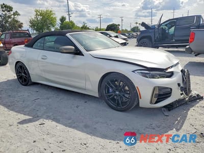 Czwarte zdjęcie samochodu z boku: 2021 BMW M440I VIN:WBA53AT08MCG90650 - miniatura