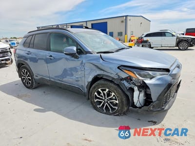 Czwarte zdjęcie samochodu z boku: 2024 TOYOTA COROLLA CROSS HYBRID SE VIN:7MUFBABG1RV050653 - miniatura
