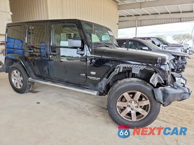 Czwarte zdjęcie samochodu z boku: 2011 JEEP WRANGLER UNLIMITED JEEP 70TH ANNIVERSARY VIN:1J4HA7H16BL591047 - miniatura