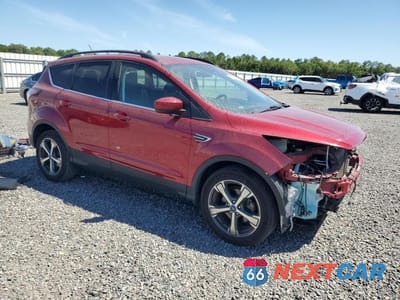 Czwarte zdjęcie samochodu z boku: 2018 FORD ESCAPE SEL VIN:1FMCU0HD1JUA79466 - miniatura