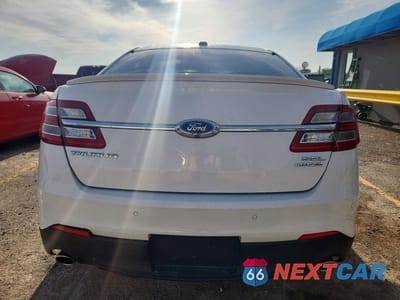 Zdjęcie 6 z 12 samochodu: 2016 FORD TAURUS SEL VIN:1FAHP2E80GG137682 - miniatura