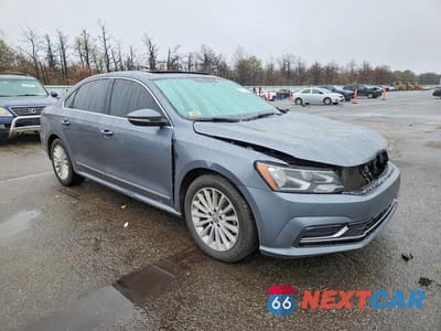 Czwarte zdjęcie samochodu z boku: 2017 VOLKSWAGEN PASSAT SE VIN:1VWBT7A3XHC078813 - miniatura