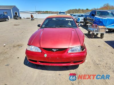 Piąte zdjęcie samochodu w środku: 1996 FORD MUSTANG VIN:1FALP444XTF163081 - miniatura