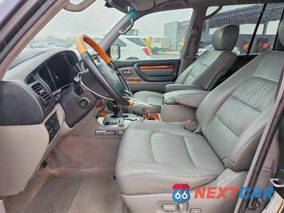Zdjęcie 7 z 13 samochodu: 2004 LEXUS LX 470 VIN:JTJHT00W943547090 - miniatura