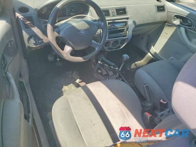 Zdjęcie 8 z 13 samochodu: 2006 FORD FOCUS ZX3 VIN:1FAHP31N86W201876 - miniatura