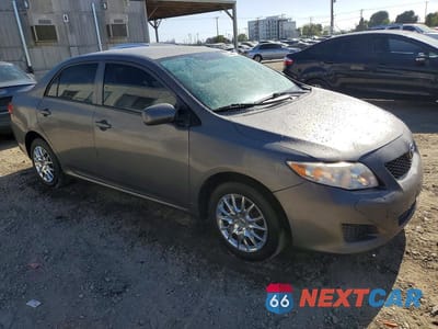 Czwarte zdjęcie samochodu z boku: 2010 TOYOTA COROLLA LE VIN:JTDBU4EE6AJ077458 - miniatura