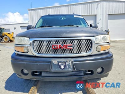 Piąte zdjęcie samochodu w środku: 2005 GMC YUKON XL DENALI VIN:1GKFK66U65J234490 - miniatura