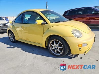 Czwarte zdjęcie samochodu z boku: 2004 VOLKSWAGEN NEW BEETLE GL TDI VIN:3VWBR31CX4M416467 - miniatura