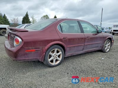 Trzecie zdjęcie samochodu z tyłu: 2002 NISSAN MAXIMA GXE VIN:JN1DA31D02T443593 - miniatura