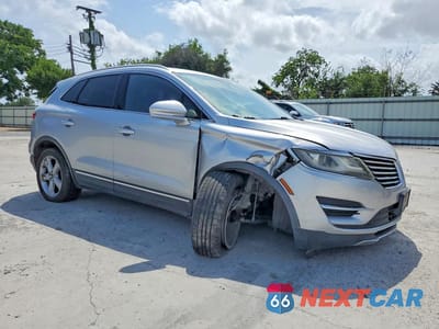 Czwarte zdjęcie samochodu z boku: 2017 LINCOLN MKC PREMIERE VIN:5LMCJ1C96HUL33844 - miniatura