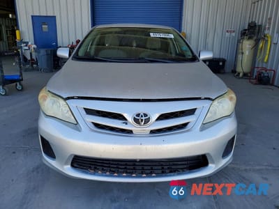 Piąte zdjęcie samochodu w środku: 2011 TOYOTA COROLLA LE VIN:JTDBU4EE4BJ092168 - miniatura