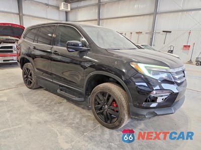 Czwarte zdjęcie samochodu z boku: 2018 HONDA PILOT EXLN VIN:5FNYF5H74JB027592 - miniatura