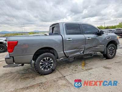Trzecie zdjęcie samochodu z tyłu: 2017 NISSAN TITAN SV VIN:1N6AA1E55HN527250 - miniatura