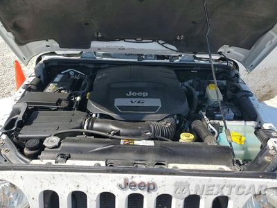 Zdjęcie 12 z 13 samochodu: 2015 JEEP WRANGLER UNLIMITED SAHARA VIN:1C4BJWEG4FL540926 - miniatura