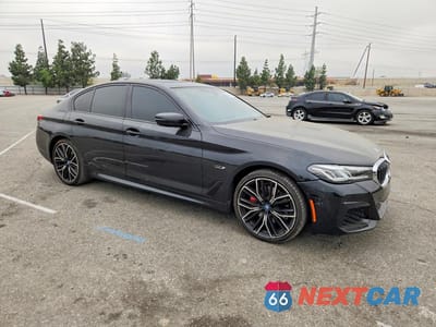 Czwarte zdjęcie samochodu z boku: 2022 BMW 530E VIN:WBA13AG05NCJ42189 - miniatura