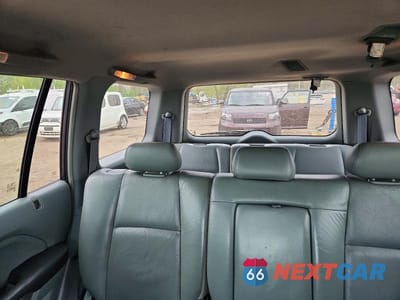 Zdjęcie 10 z 12 samochodu: 2003 HONDA PILOT EXL VIN:2HKYF18623H592184 - miniatura
