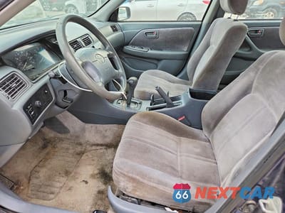 Zdjęcie 7 z 11 samochodu: 1999 TOYOTA CAMRY LE VIN:JT2BG28K3X0290095 - miniatura